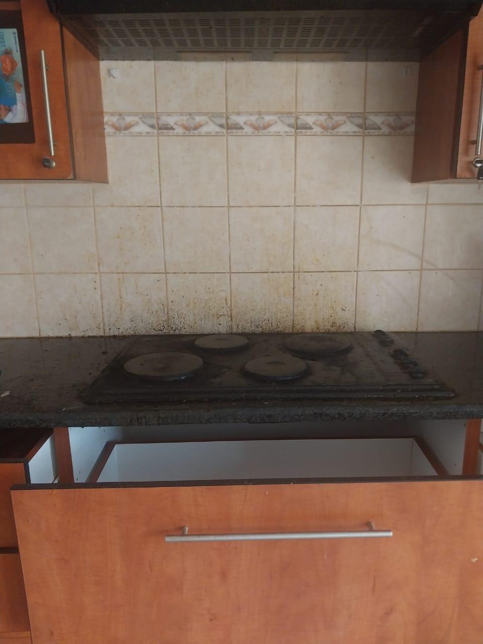 Cluttered office before cleaning